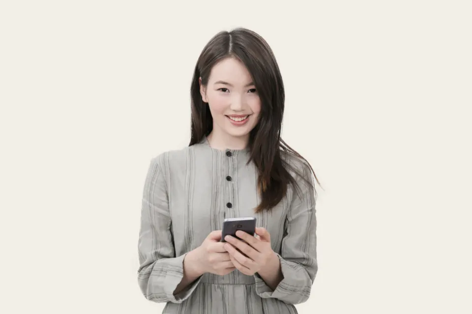 A founder checking her phone